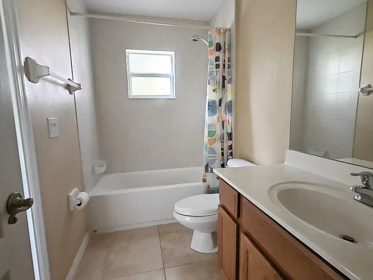 Nice sized 2nd bathroom with tub. Great storage space in cabinets and additional storage closet right outside the bathroom