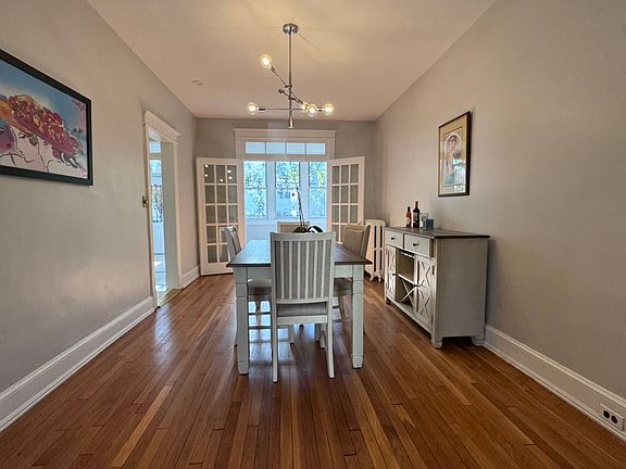 Dining with access to kitchen and sunroom