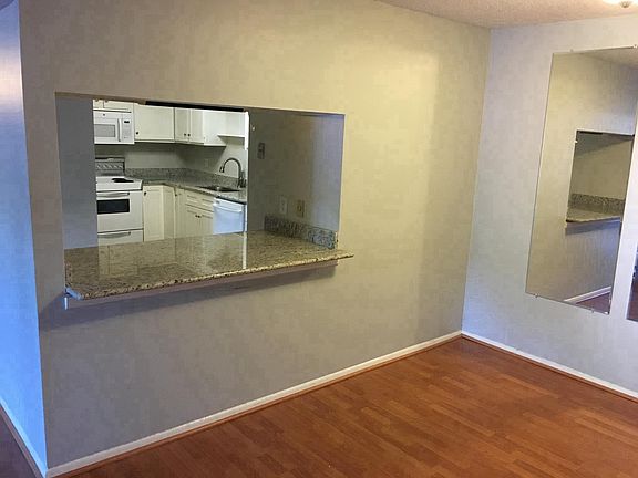 Breakfast bar connects kitchen and dining 