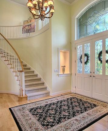2 Story entry with hardwood floors & spiral staircase