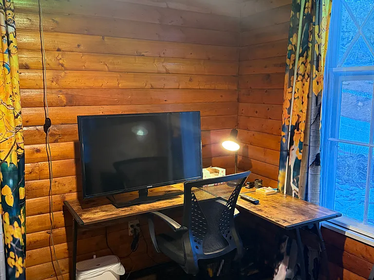 Great Office space. Can use TV as a large monitor. Has view of outside.