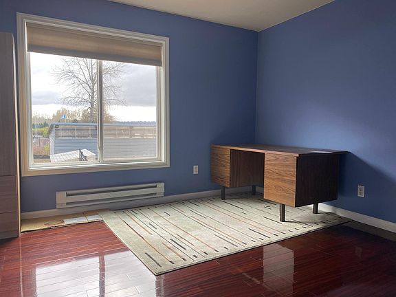 Bedroom #1 with view of the Seahawks training facility (VMAC)