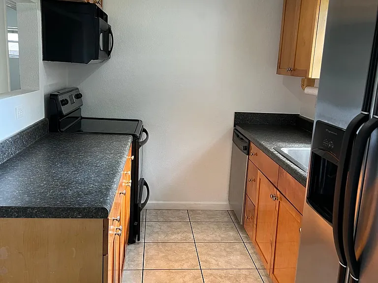 4906 Kempston Dr — Photo 3