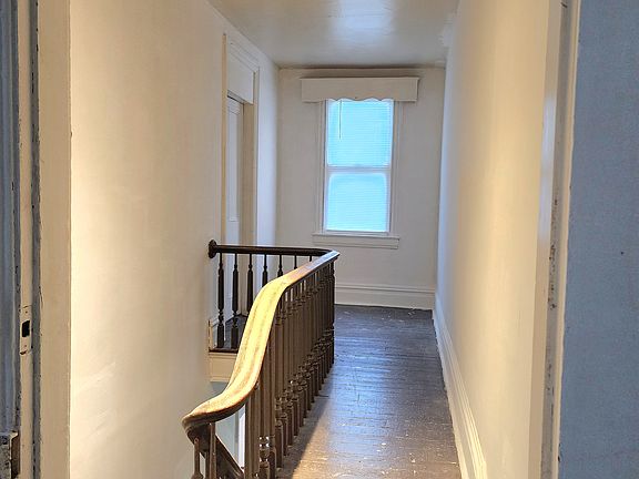 hallway leading to master bedroom