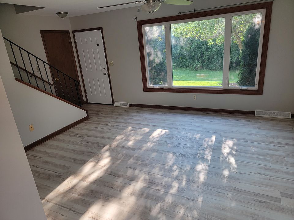 Main floor living room (curtains have since been installed)