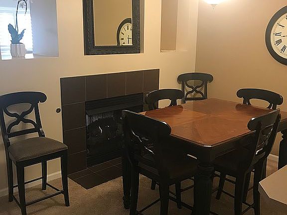 Dining room w/ 2-sided fp. 