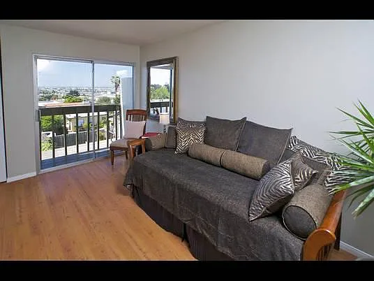 Smaller Bedroom, upstairs. Best used as office and/or guest room.