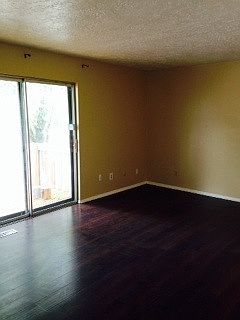 Spacious living room. Deck off living room.