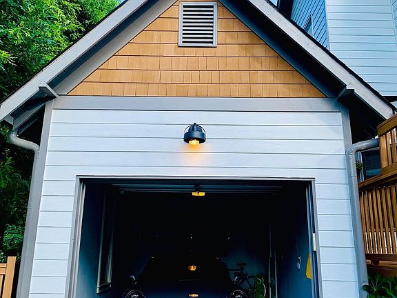 Private driveway along with detached garage.