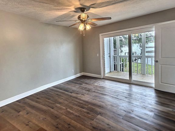 Master bedroom with access to back deck.