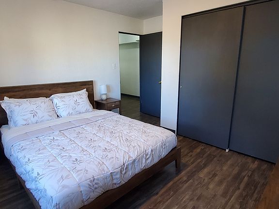 Bedroom 2 - Queen sized bed, dresser, tv