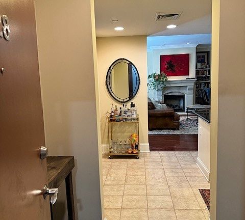 Entry from the elevator hall way - convenient for guests and entry from your covered parking