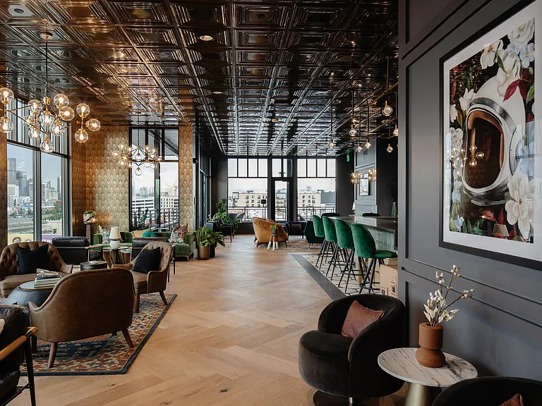 Gather and unwind in the rooftop lounge, designed for memorable moments with friends.