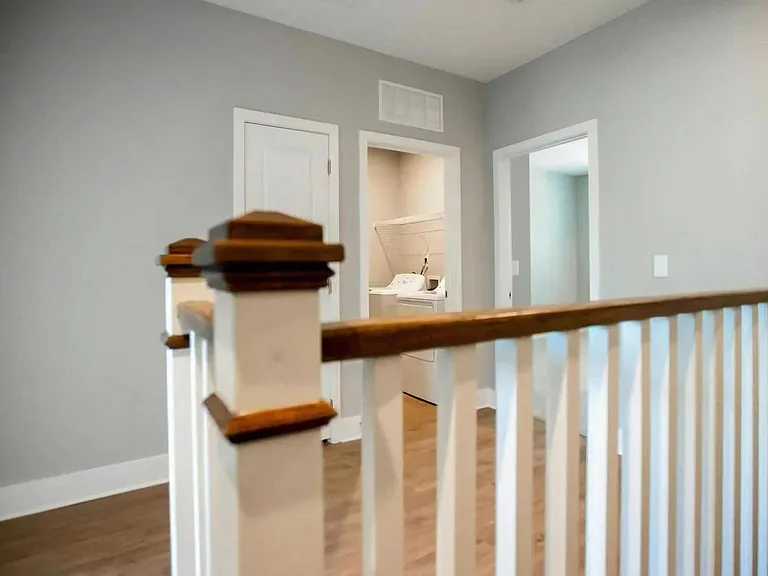 Upper Hallway with In-Unit Laundry and Access to Bedrooms