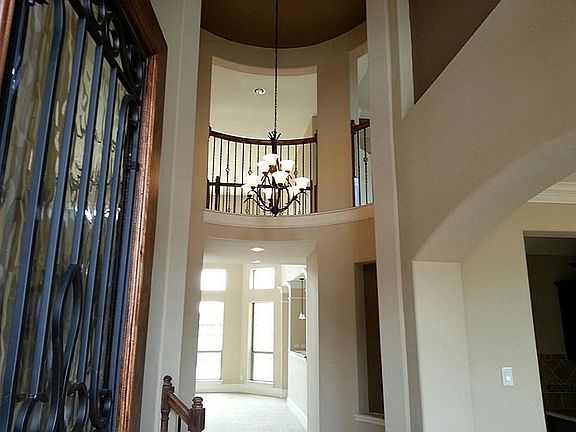 Welcome guests into an incredible foyer that open up to a soaring  2 story rotunda!
