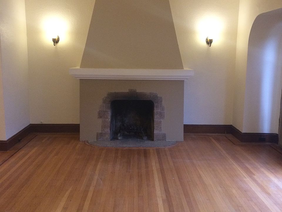The living room with a natural-burning fireplace.