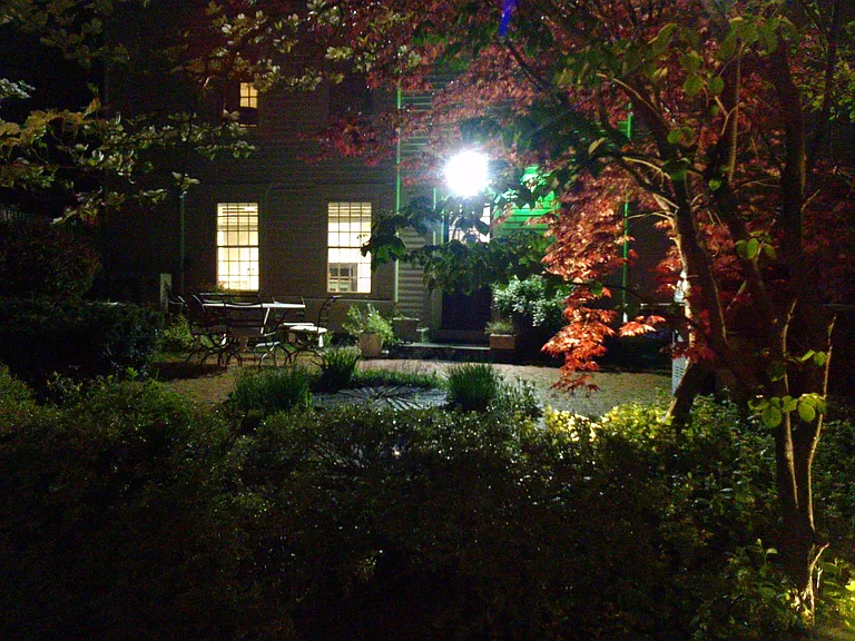Deck and Yard setting (night time) shared fast internet is available.