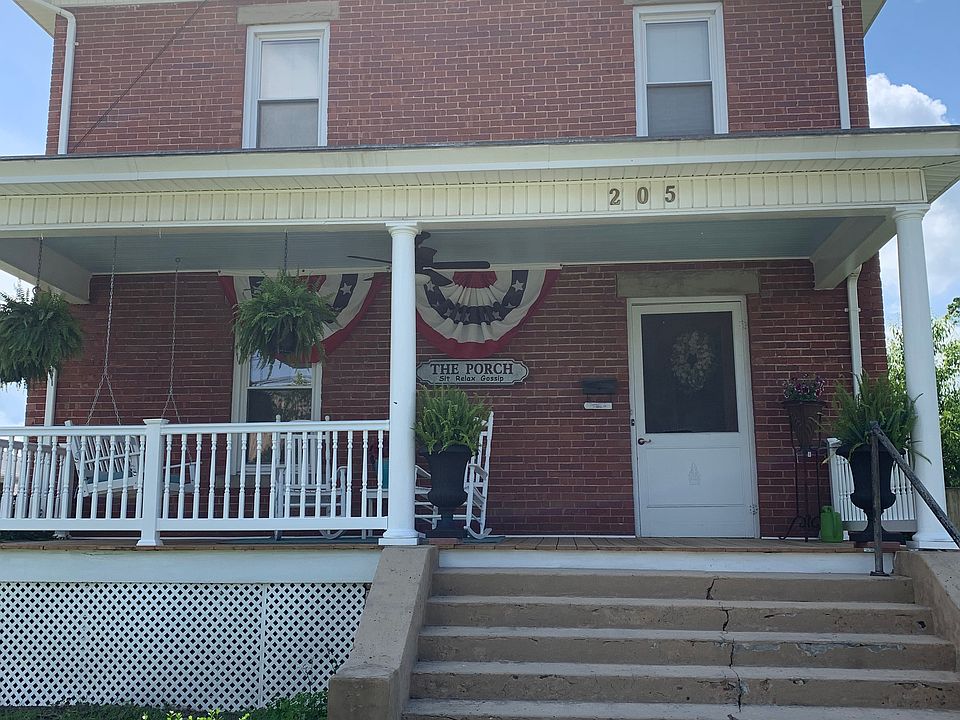 Brick Colonial home. 