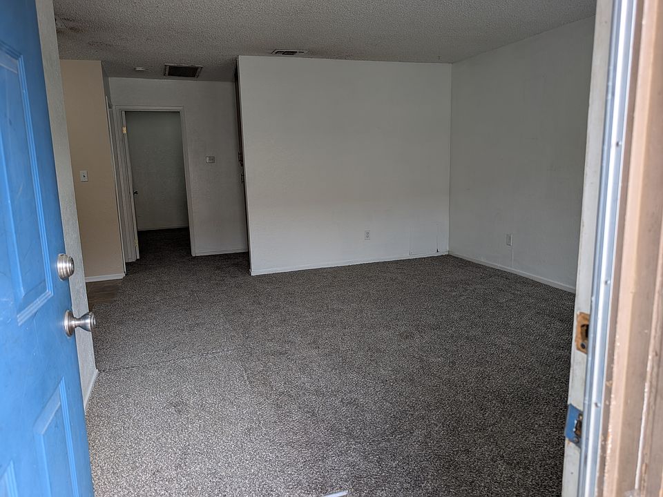 Apt 2 View of living room and hallway to bedrooms from open front door