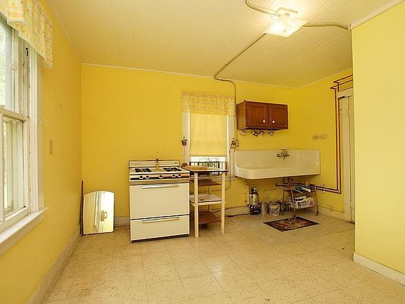 Kitchen with farm sink