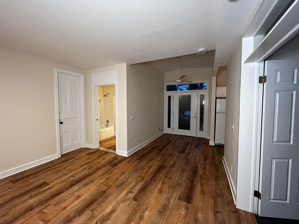 Living space looking back at private entry and bathroom.