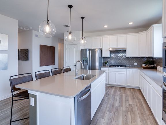Abundant cabinet space in kitchen