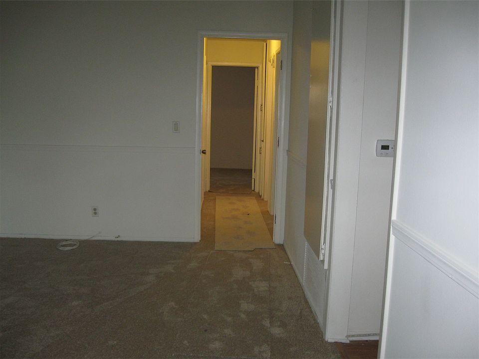 View from Living Room through hallway to 3 bedrooms and 2 b