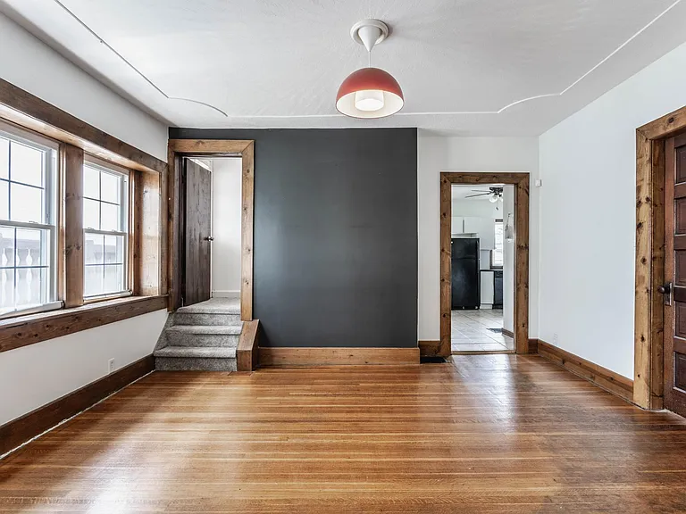 Dining Room & Stairs to Primary Suite