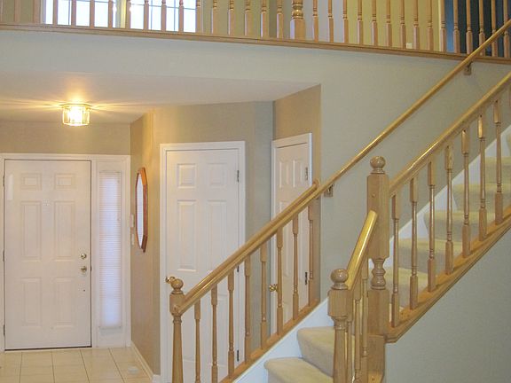 Front door, half bathroom and Living room!