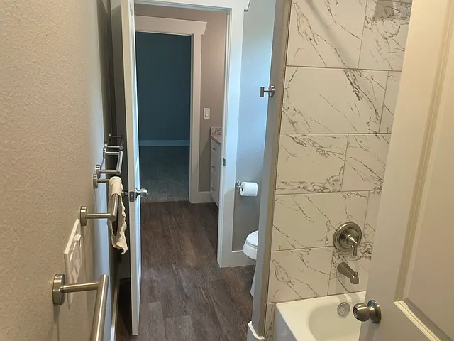 Jack and jill bath upstairs with tub/shower combo.