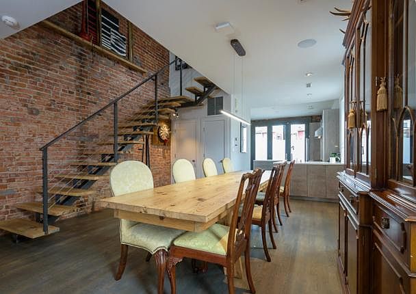 First floor 10_ long dining table with kitchen at back