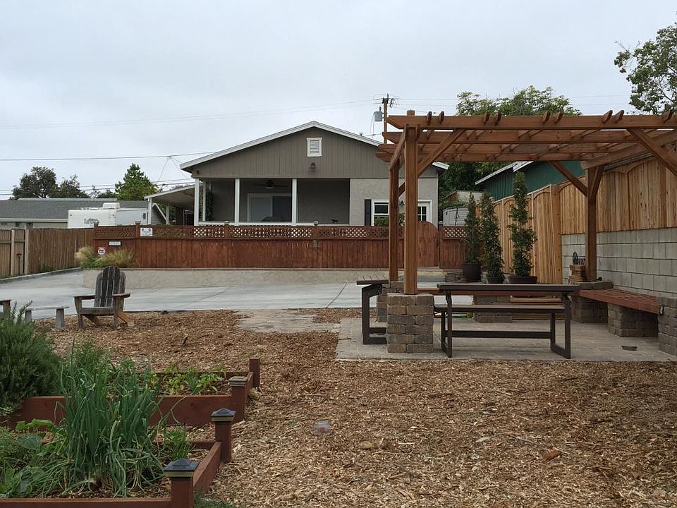 View of front of Property w/ community garden area