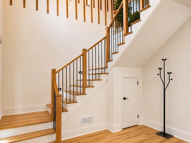 Step into your own private paradise. Hang your coat on the provided hooks, take a load off on the plush bench and begin your luxurious home!