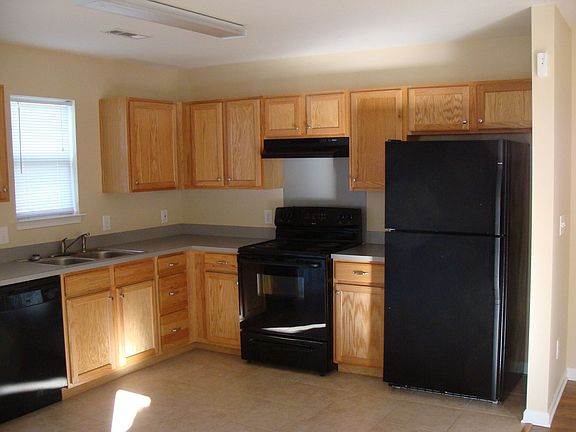 Black appliances in kitchen.