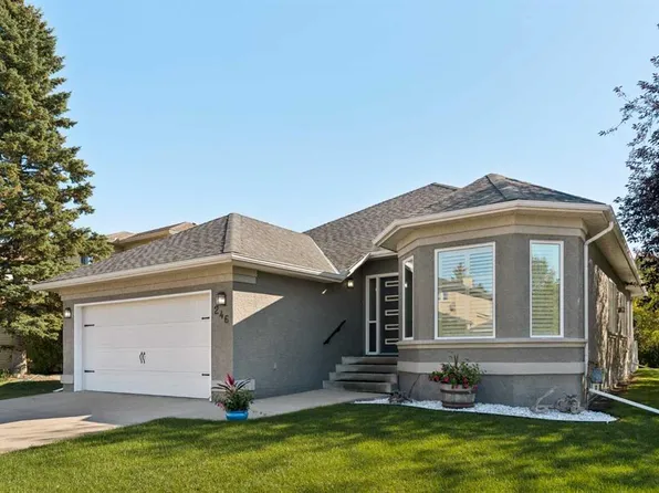246 N Woodpark Grn SW, Calgary, AB T2W 6E9