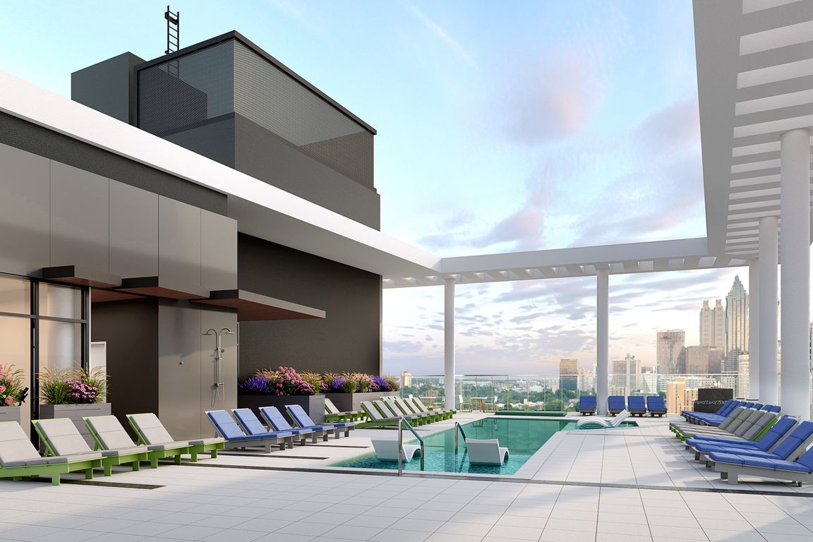 Rooftop pool with expansive sundeck, cabanas, and 360-degree skyline views.