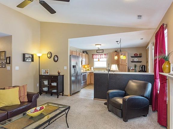 A vaulted ceiling helps to create the open concept.