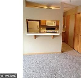 Kitchen with all the appliances and breakfast bar
