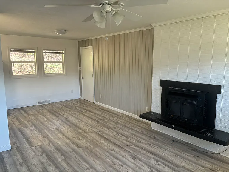 Living room opens up to breakfast area with easy access to the kitchen.