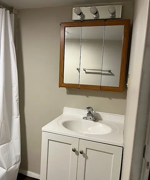 Bathroom. New vanity, sink, faucet.
