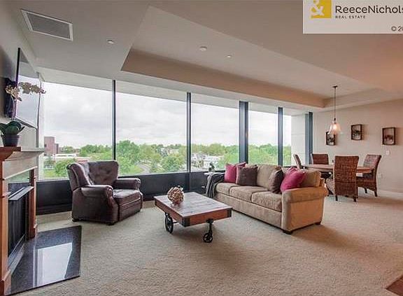 Open, versatile living space with a wall of windows allows for beautiful southern views