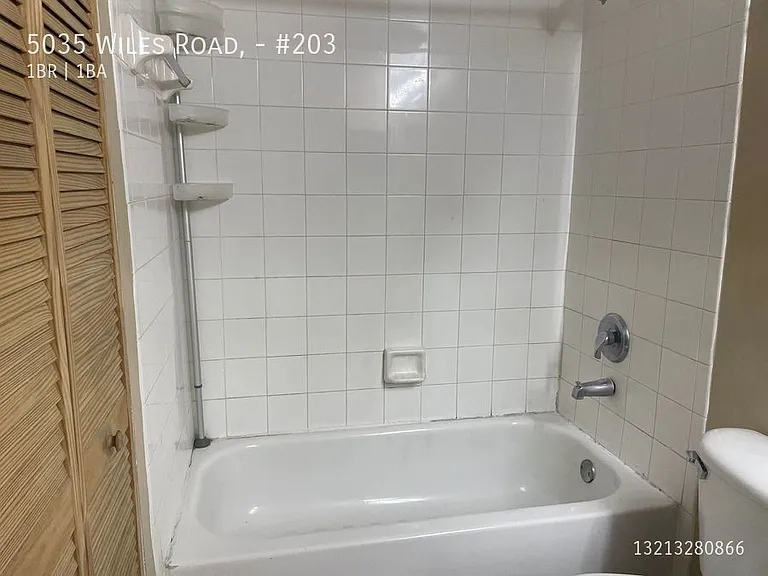 5035 Wiles Rd #203 — Photo 8
