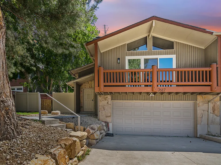 7687 S Winterdale Cir — Photo 1