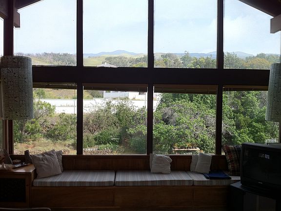 Window seat overlooking back yard