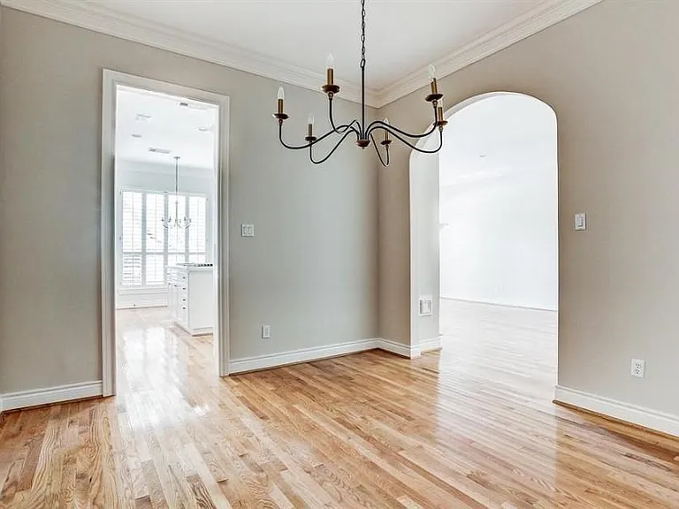 The formal dining room gives you a great conversation piece with this vintage inspired chandelier