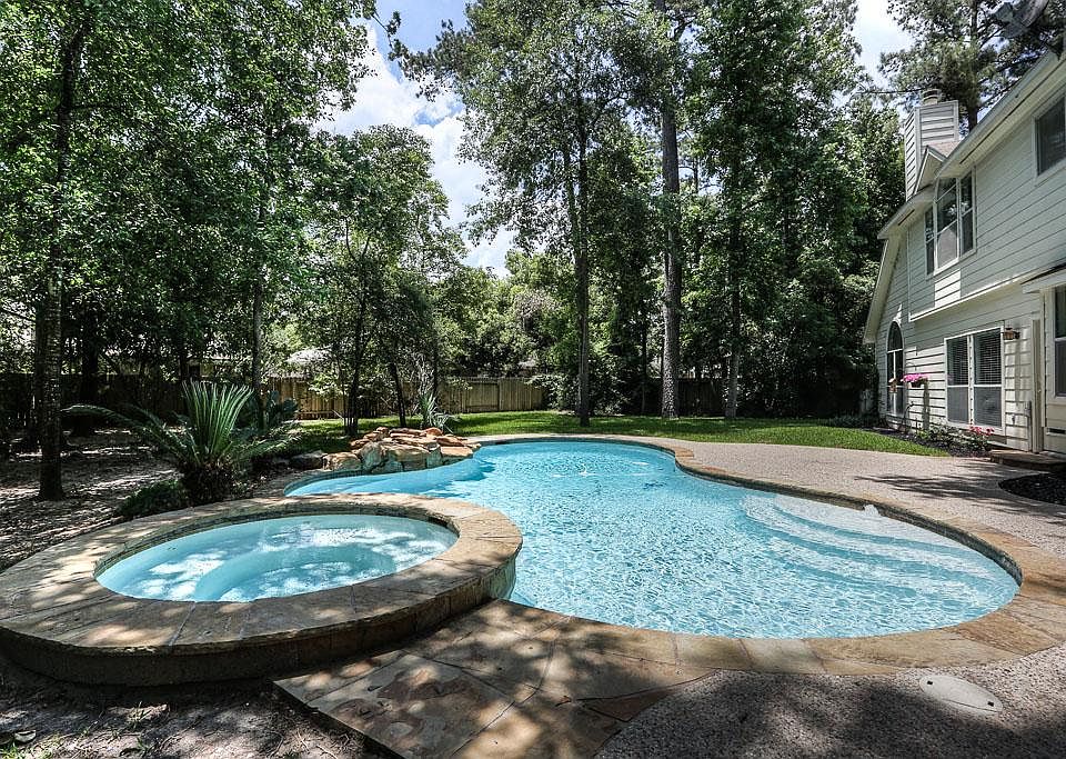 Your very own backyard resort! Pool, Spa, Water falls, and a HUGE backyard!