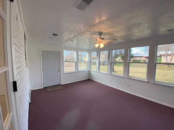 Awesome climate controlled sunroom with new double paned windows!
