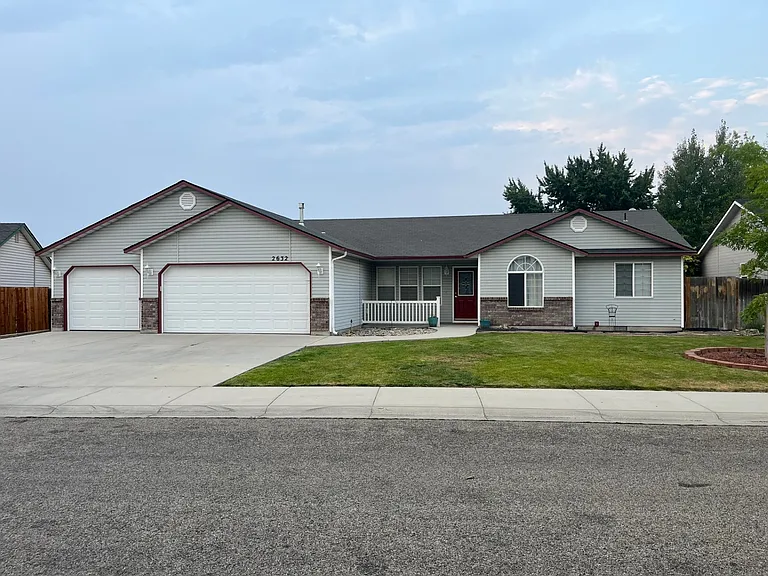 No Stairs! 4 Bdr 2 Bath and look at the 3 car garage!