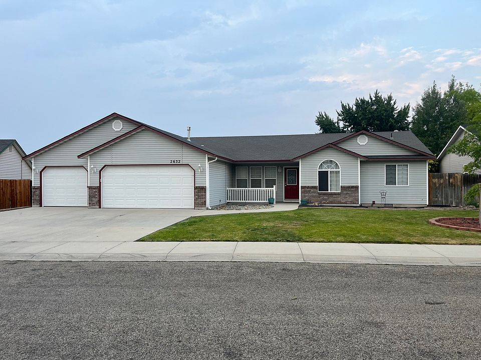 No Stairs! 4 Bdr 2 Bath and look at the 3 car garage!