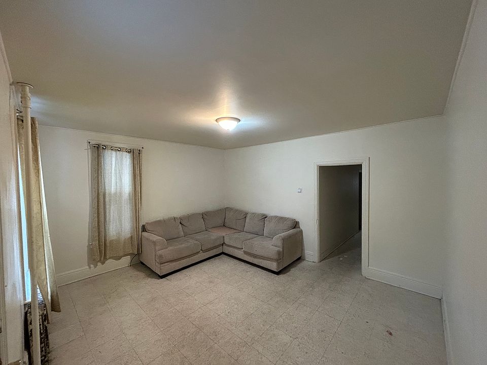Living room with full sized section so that size of room can be appreciated. Picture from front door looking into room